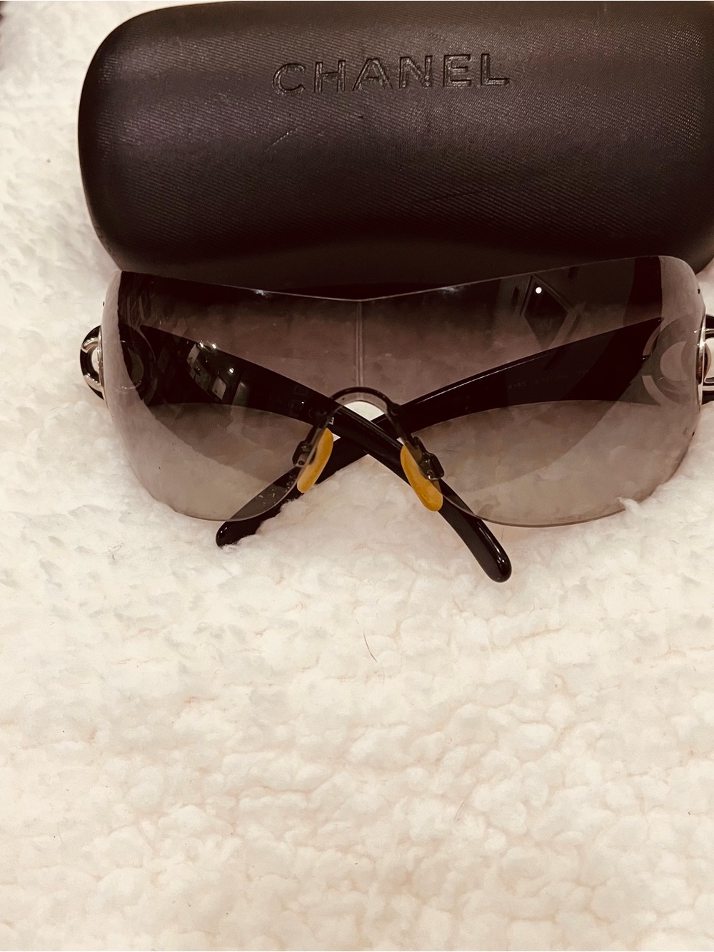 CHANEL Black Gradient Rimless Shield Sunglasses with Subtle Gold Accents
